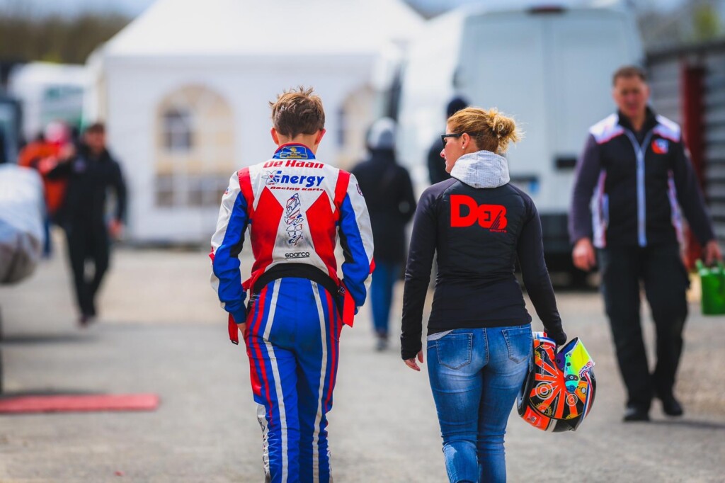 Coach walking with driver